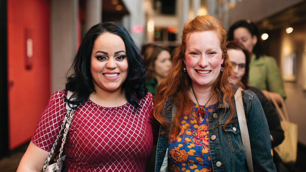 Photo of two women smiling.