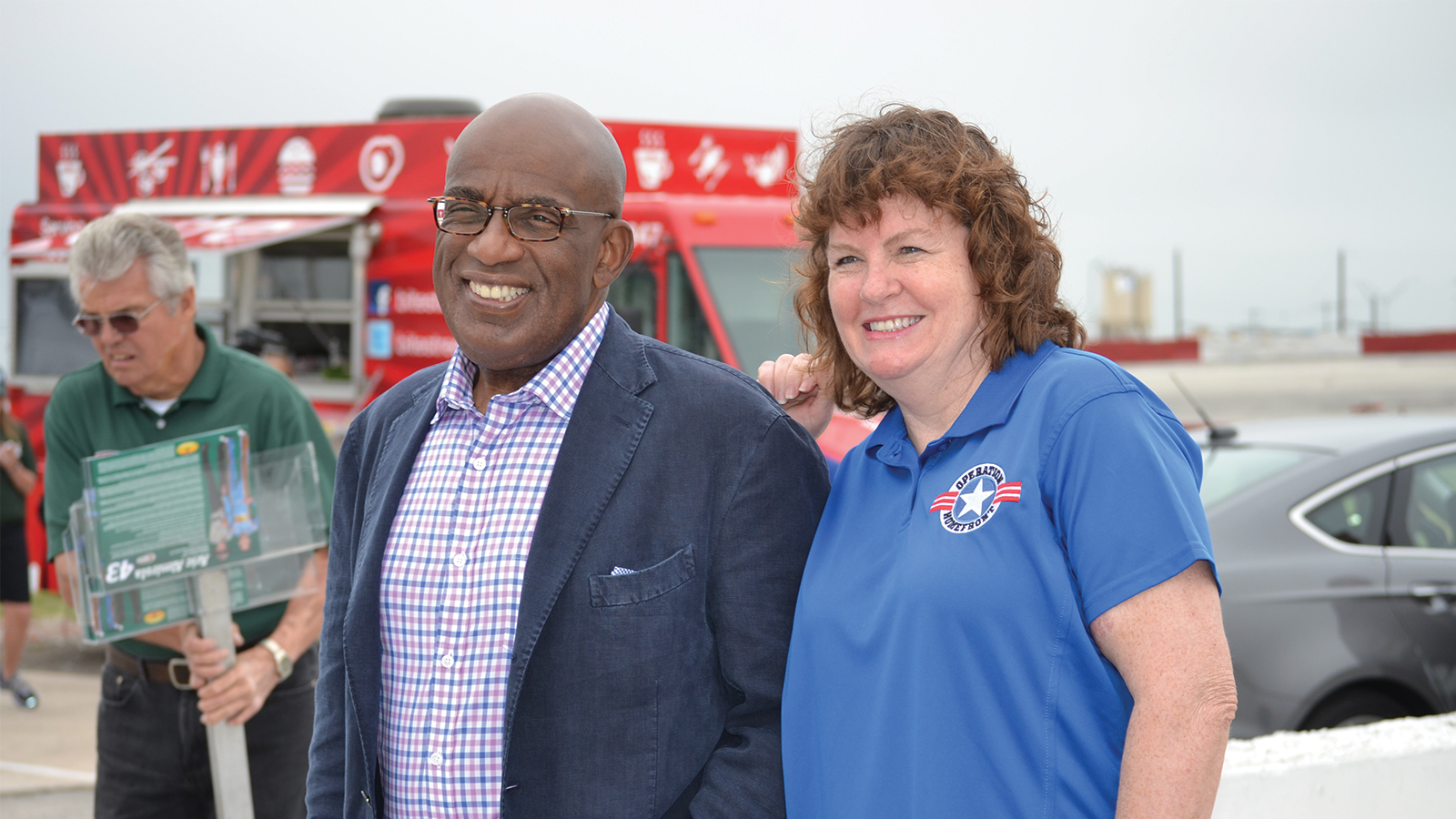 Judy trevin and Al rocker at an event to serve military families