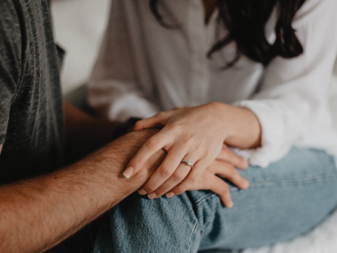 wife holding husband's hand