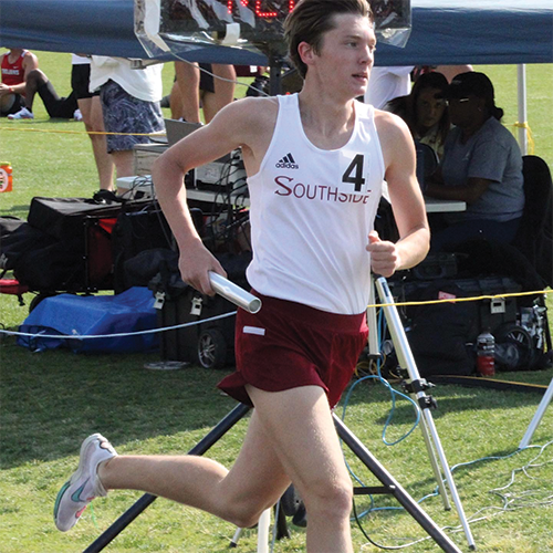 boy in running gear