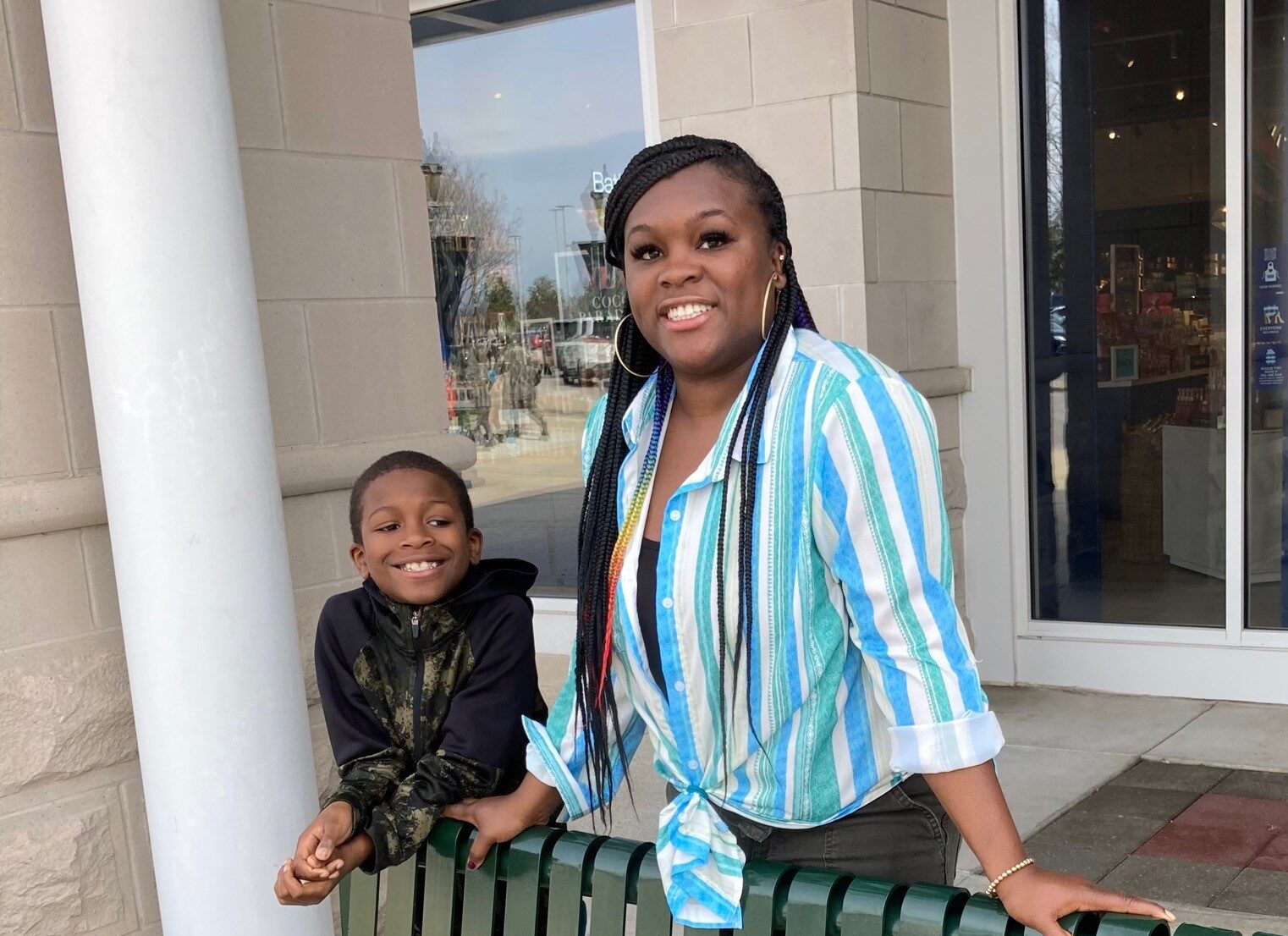 mom and son smiling